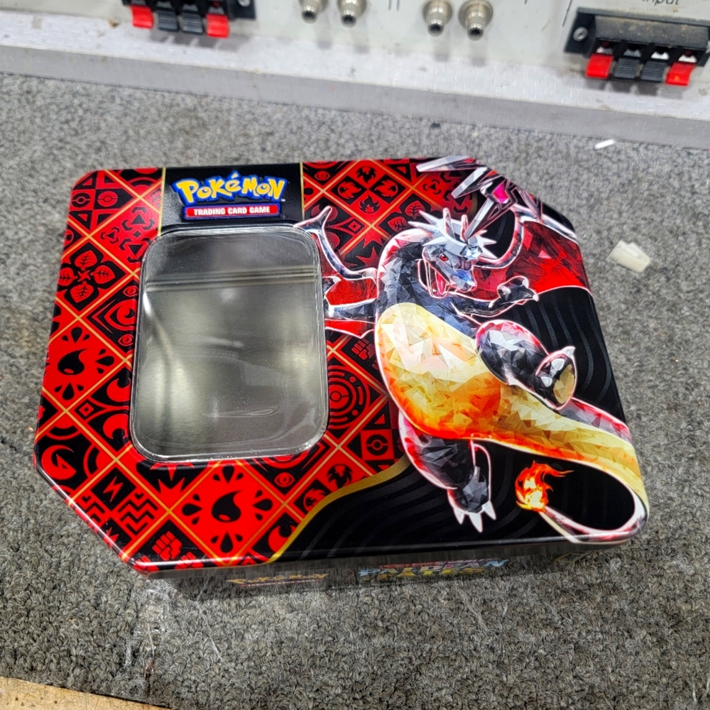 Pokemon paldean Fates Charizard tin